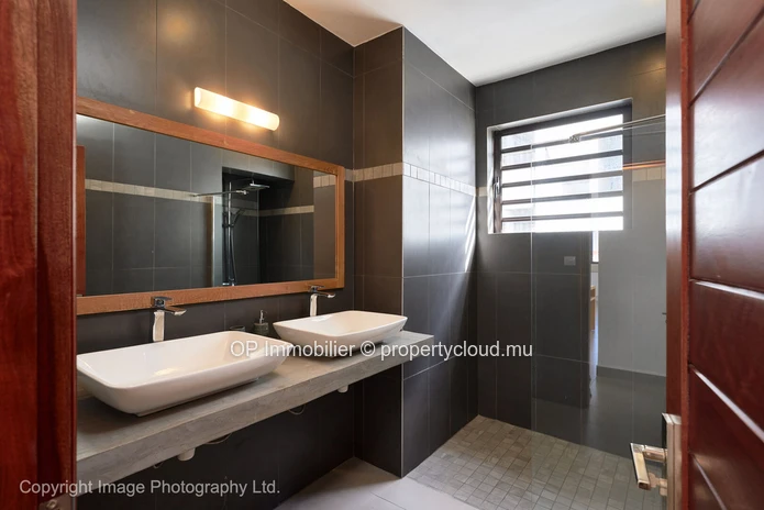"Stylish Apartment with Communal Pool in Pereybere, Grand Baie - Fully Furnished, Close to Amenities - Only 295k Euros!"