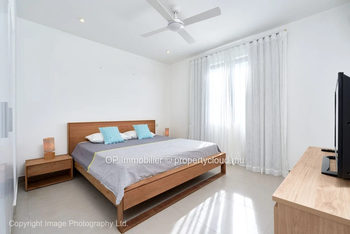 "Stylish Apartment with Communal Pool in Pereybere, Grand Baie - Fully Furnished, Close to Amenities - Only 295k Euros!"