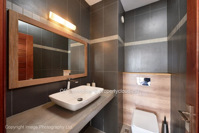 "Stylish Apartment with Communal Pool in Pereybere, Grand Baie - Fully Furnished, Close to Amenities - Only 295k Euros!"
