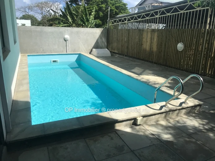 "Stylish Apartment with Communal Pool in Pereybere, Grand Baie - Fully Furnished, Close to Amenities - Only 295k Euros!"